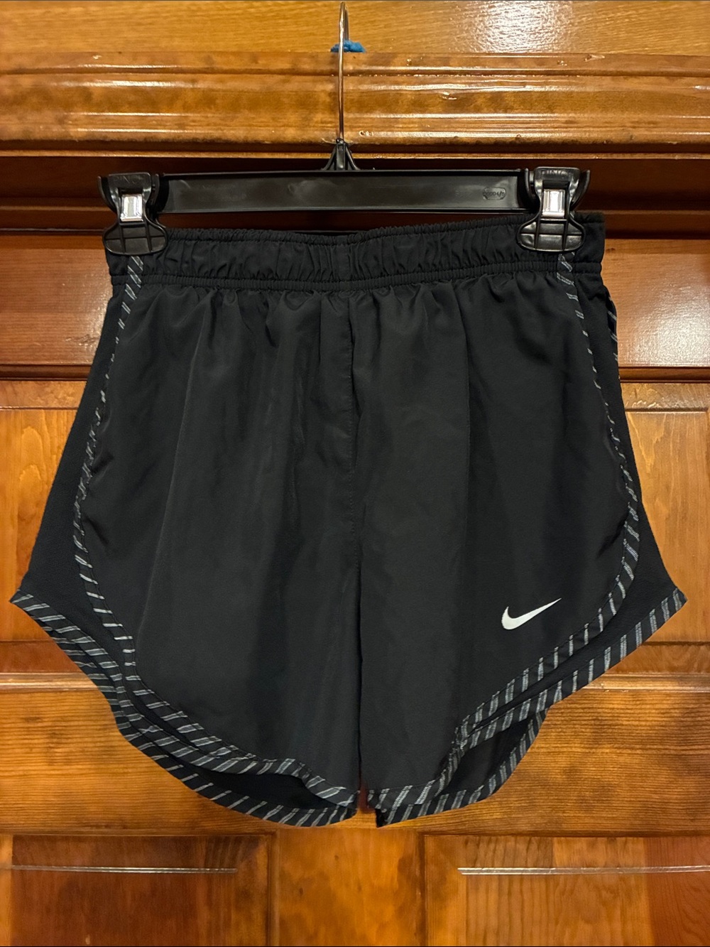 Small Nike Black Lined Athletic Shorts with Gray Striped Trim, Mesh Side Panels